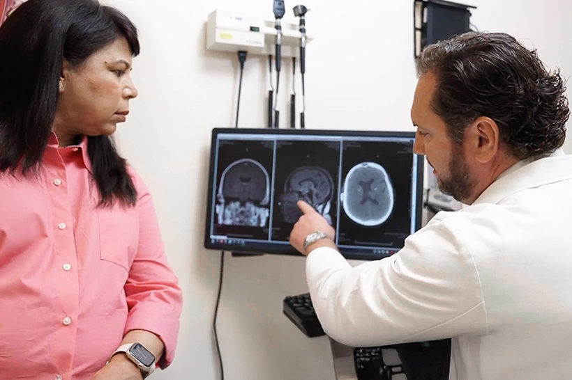 Parkinson's Patient with provider looking at scans